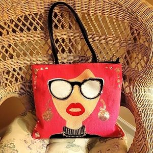Womens bag. ADORABLE! Never used! New. 15 inches wide, 14 inches deep.